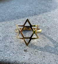 Load image into Gallery viewer, Willow Roe 14K Gold Star of David ring on grey concrete background