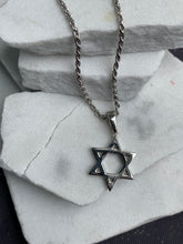 Load image into Gallery viewer, Willow Roe 14K White Gold flat Star of David charm hanging on a rope chain featured on white stone background