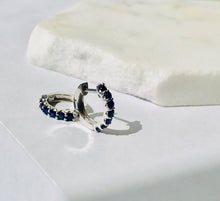 Load image into Gallery viewer, AVA BLUE SAPPHIRE HUGGIE HOOPS
