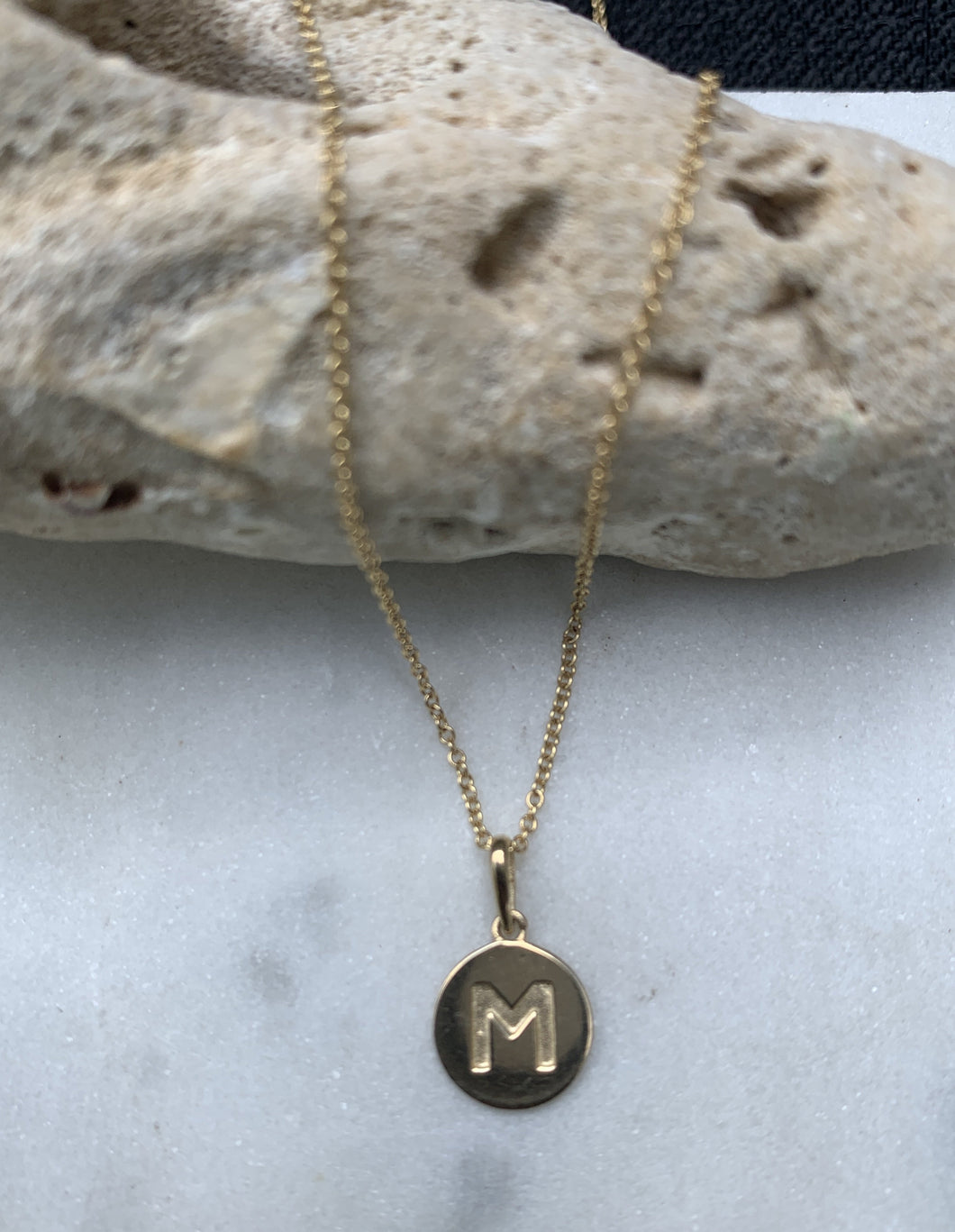 DESI INITIAL DISC CHARM NECKLACE