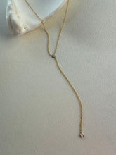 Load image into Gallery viewer, Willow Roe 14K gold single bezel diamond lariat drop necklace on a white background
